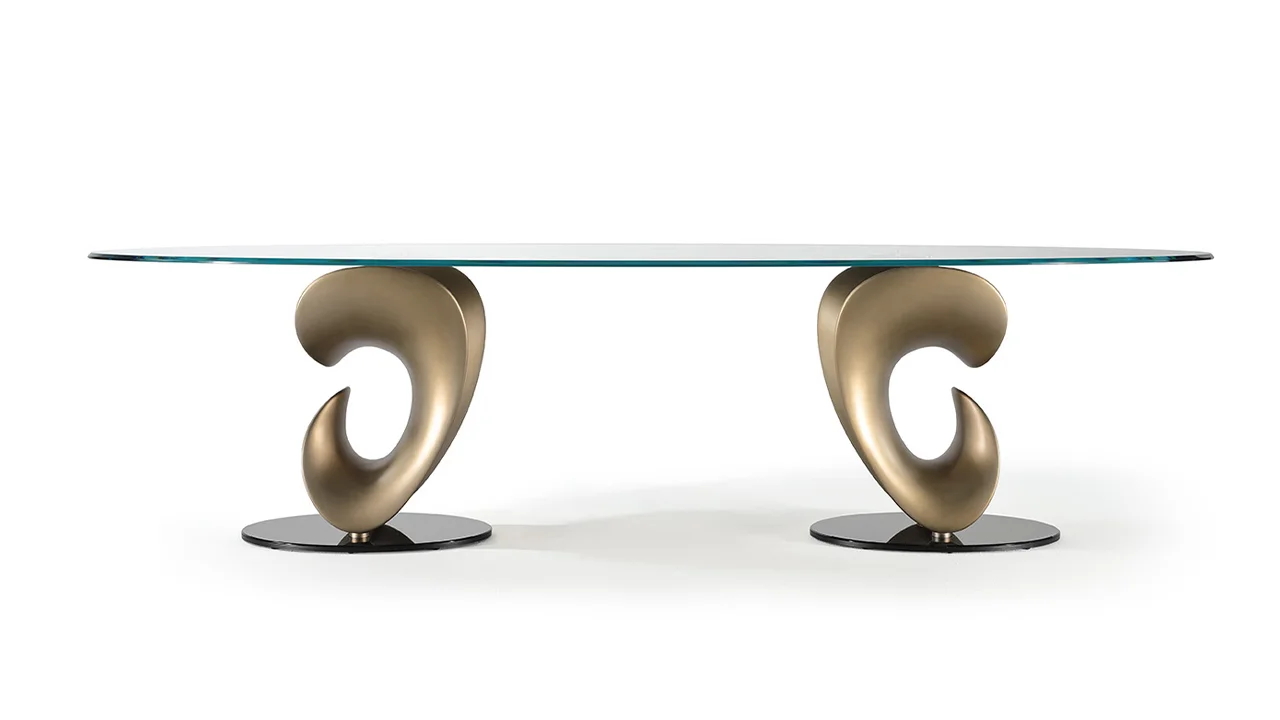 Parentesis 72 by Reflex showcased in Royal Oak Michigan showroom, modern Italian luxury dining table with artistic glass top and sculptural metal base.