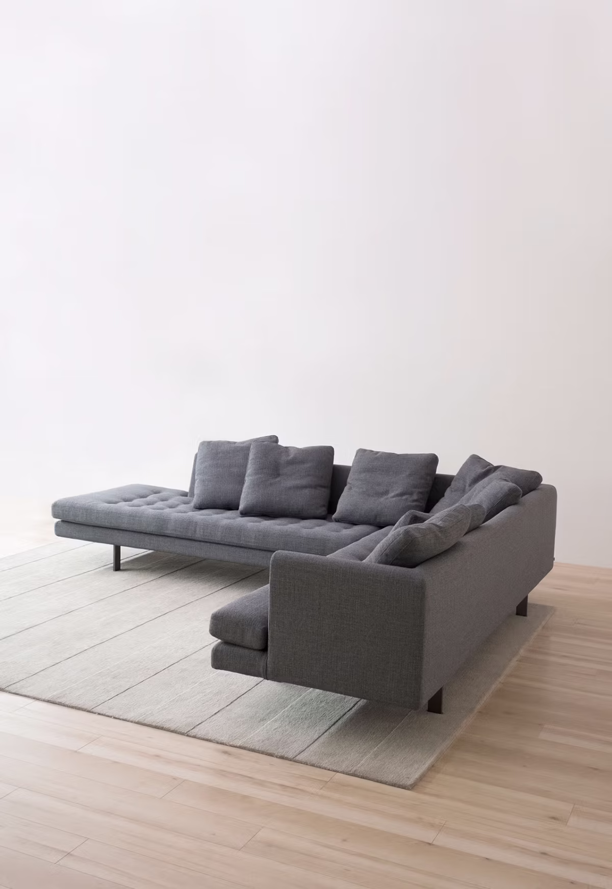 Close-up of the Edward Sectional's fabric upholstery, emphasizing its texture and craftsmanship.