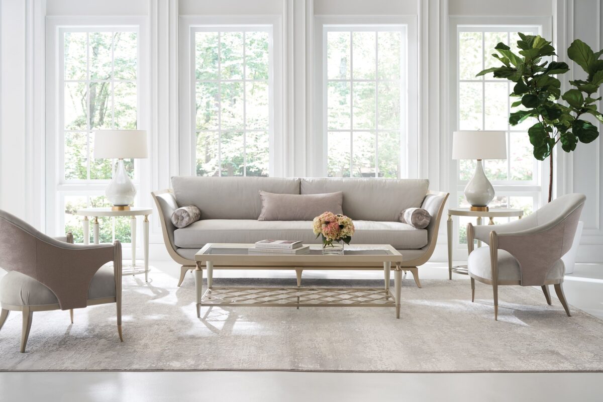 Elegant accent table featuring a warm wood surface paired with a delicate gold metal frame.