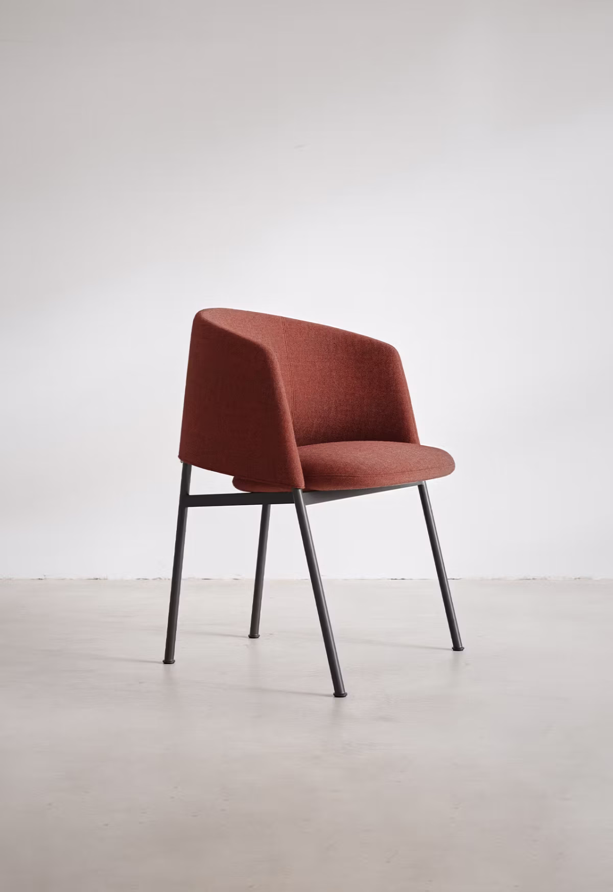 Close-up of the Collar Dining Chair with a range of fabric and leather upholstery choices.