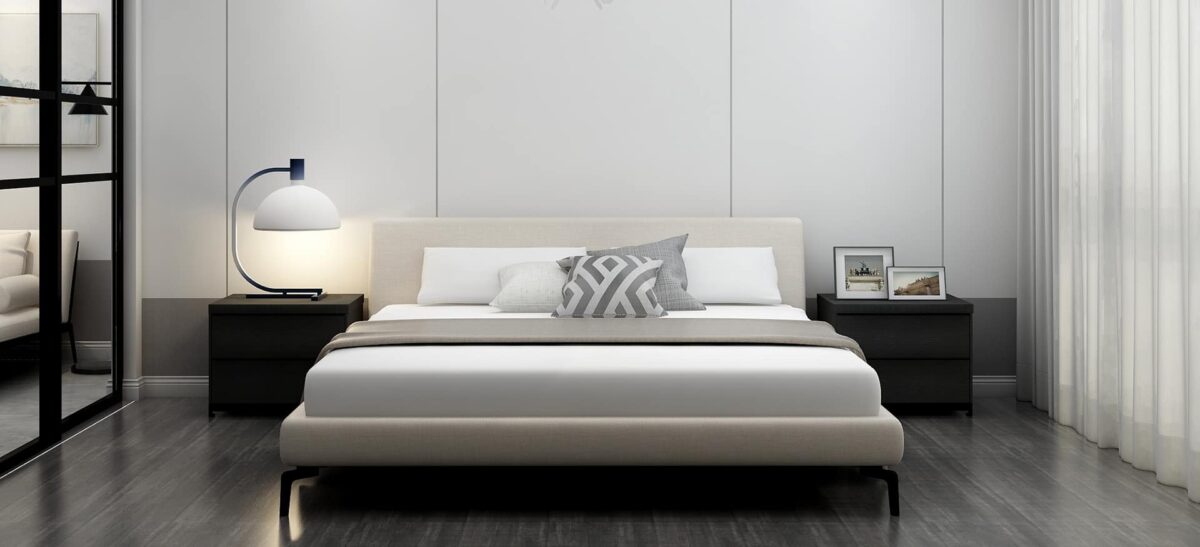 Upholstered platform bed with low profile and padded headboard by Camerichusa.