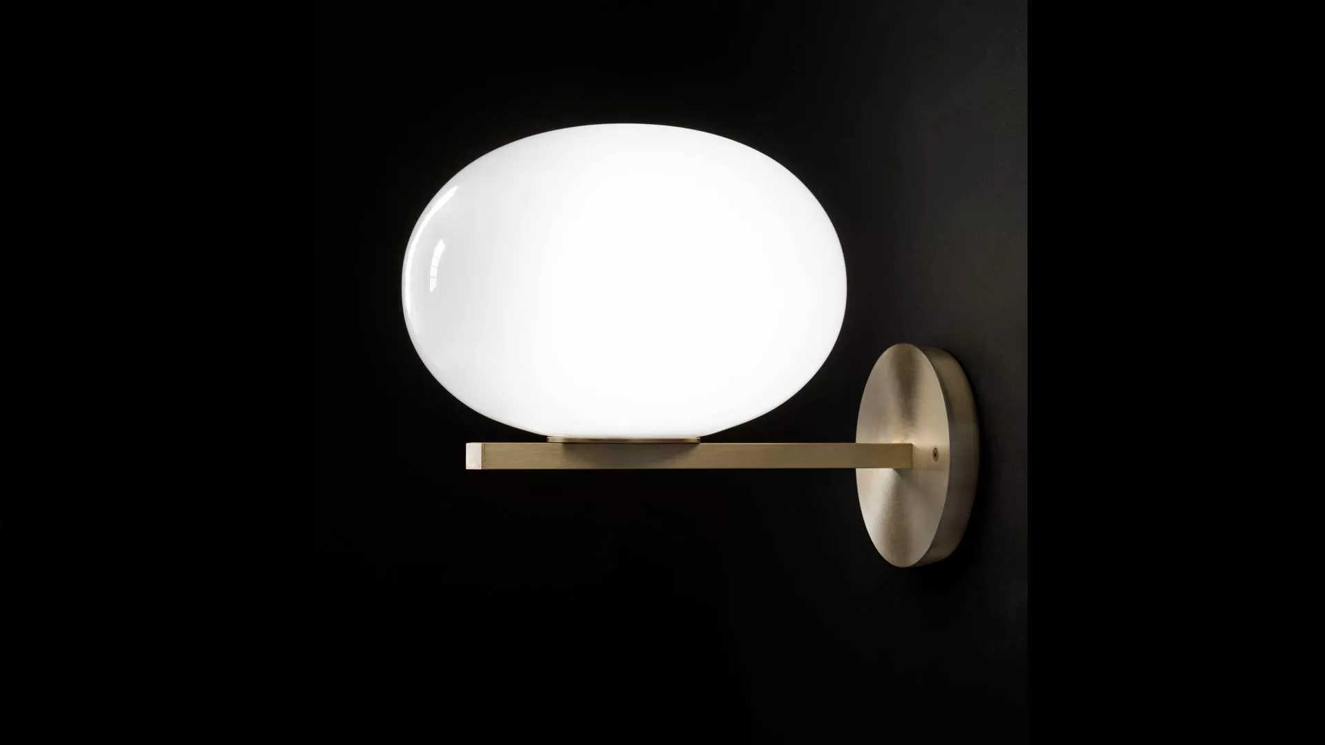 “Alba by Oluce modern Italian table lamp – opaline glass globe with brushed metal base and soft ambient light”