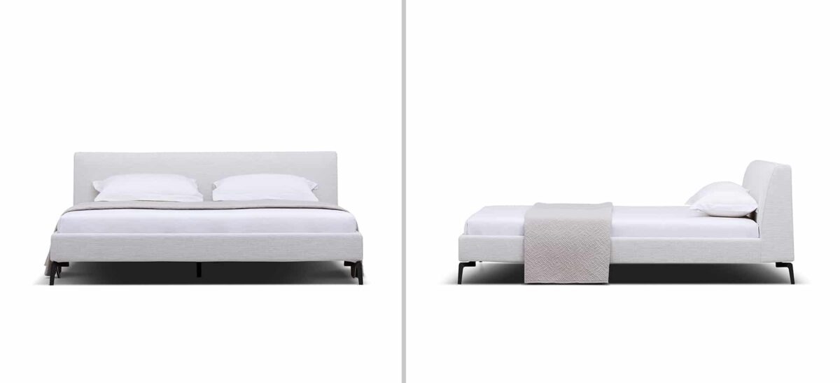 Upholstered platform bed with low profile and padded headboard by Camerichusa.