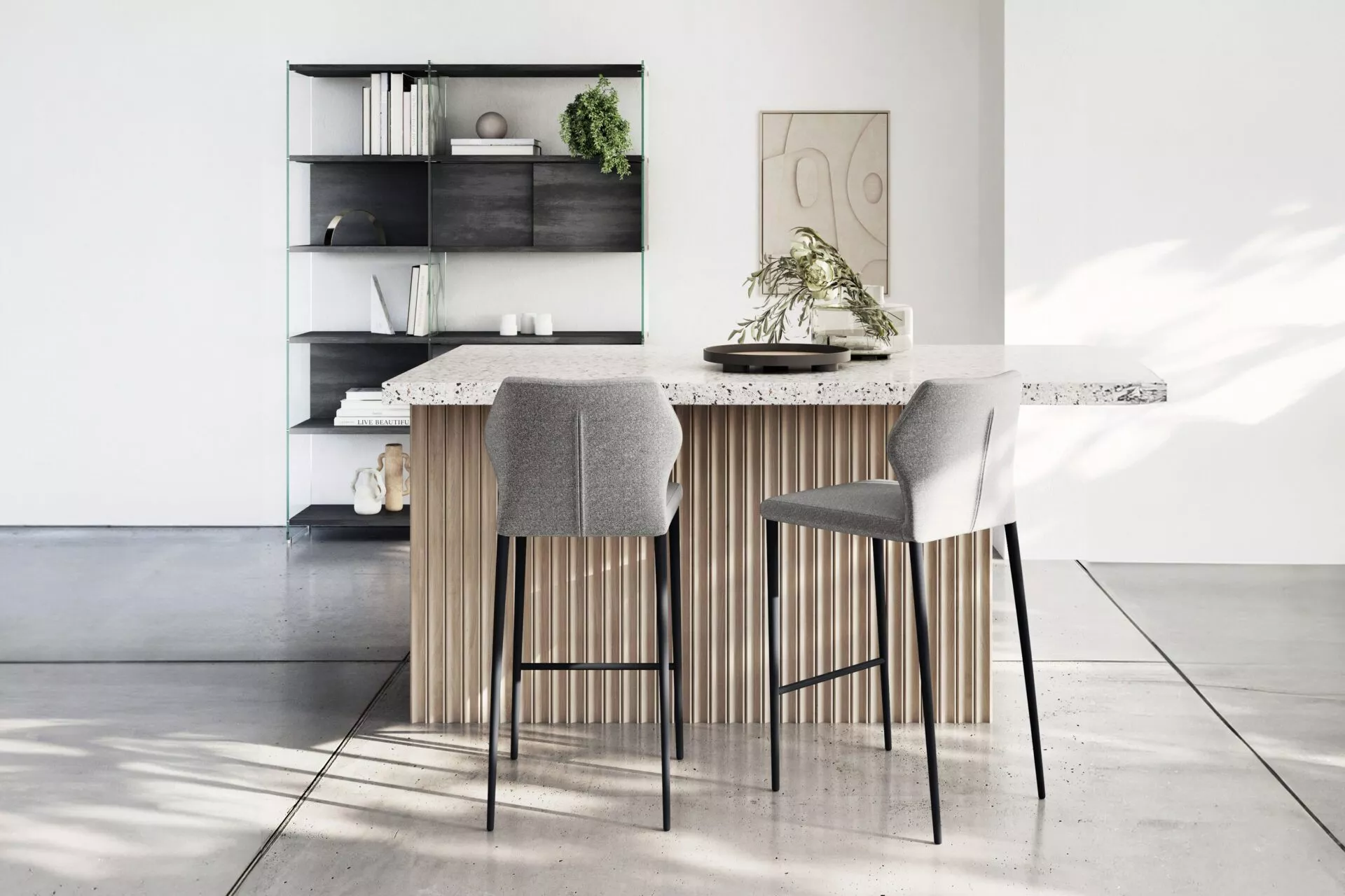 Angle kitchen counter by Peressini with L-shaped wooden countertop and slender metal supports in a minimalist kitchen.