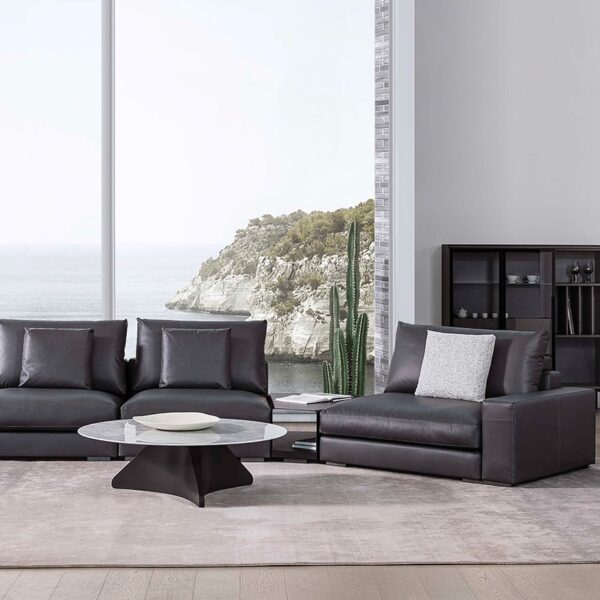Austen lounge chair with black metal frame and light grey upholstered cushions