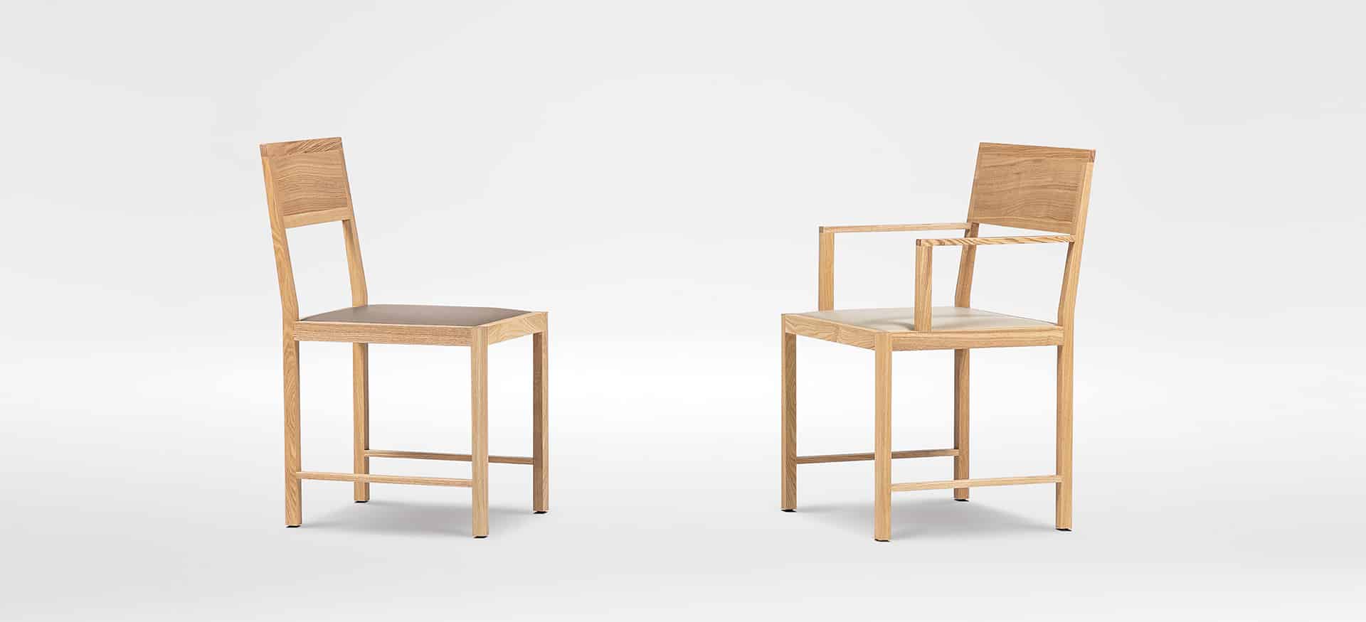 Elegant dining chair with curved back and soft upholstery by Camerich.