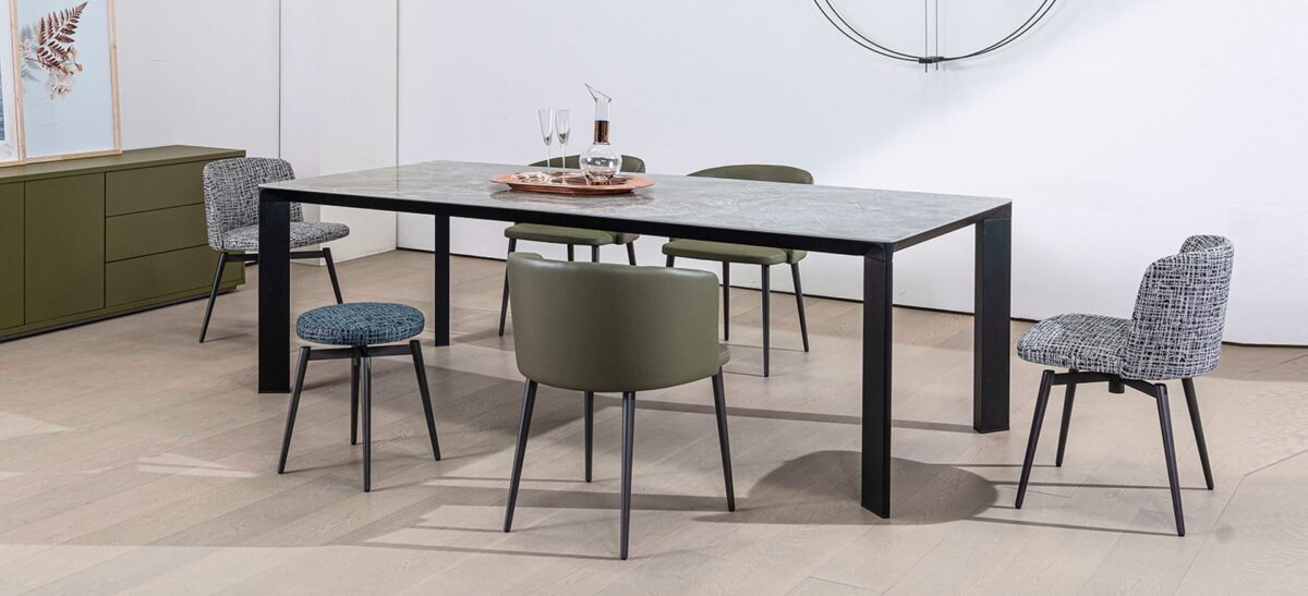 Contemporary swivel chair with smooth curves and modern design by Camerich.