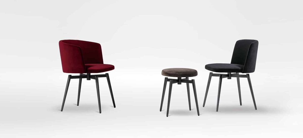 Stylish swivel chair with soft, rounded seat and elegant legs by Camerich.