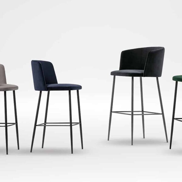 Elegant upholstered stool with soft cushioning and sleek legs by Camerich.