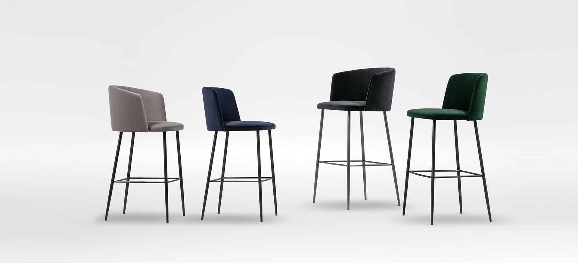 Elegant upholstered stool with soft cushioning and sleek legs by Camerich.