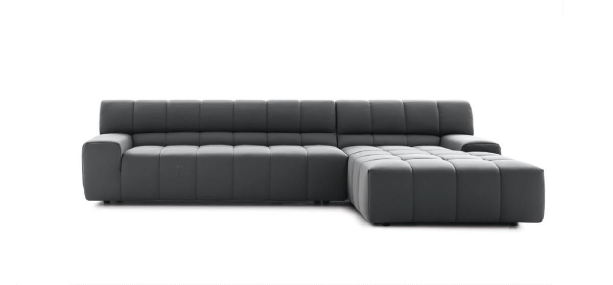 Nicoline Bric couch featuring wide arms and deep seat