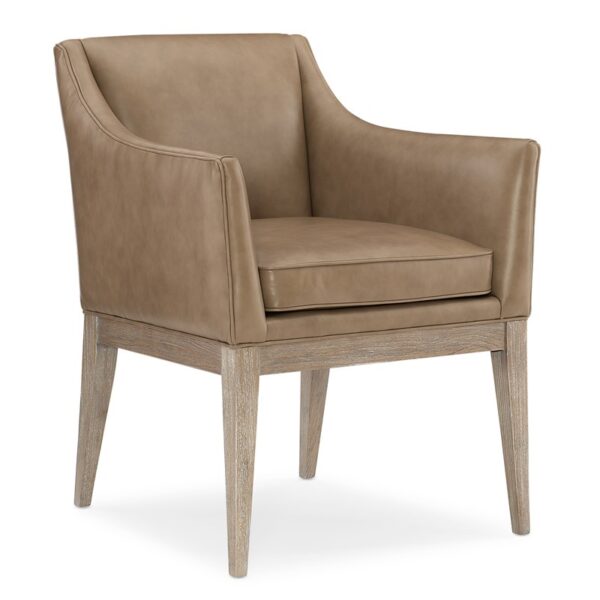 Free and Easy by Caracole — a modern accent chair with plush cushions and curved arms.