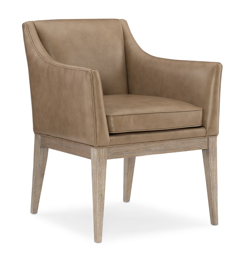 Free and Easy by Caracole — a modern accent chair with plush cushions and curved arms.