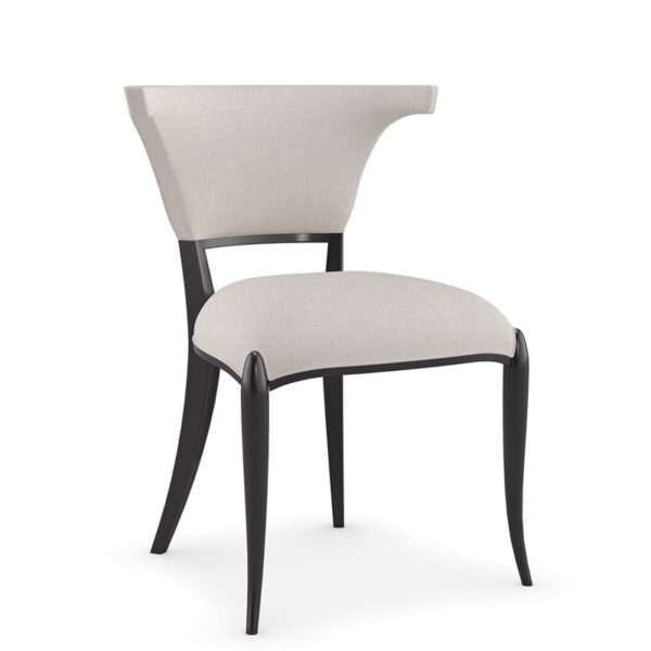Be My Guest by Caracole — an inviting upholstered chair with curved back and plush seat.