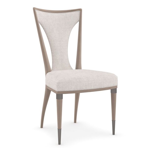 Take Your Seat by Caracole — a refined dining chair with upholstered seat and gently curved backrest.
