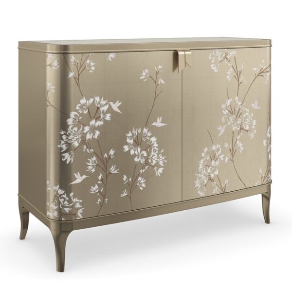 Eden by Caracole — a luxurious bed with an arched, upholstered headboard and metallic trim.