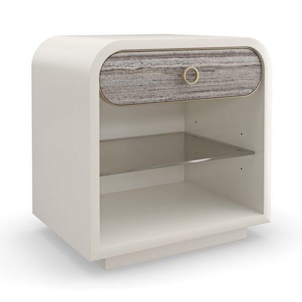Quarry console table by Caracole featuring a stone-inspired textured surface and sleek metal base.