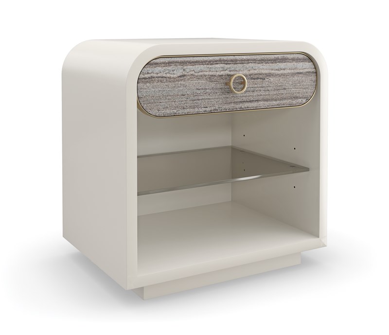 Quarry console table by Caracole featuring a stone-inspired textured surface and sleek metal base.