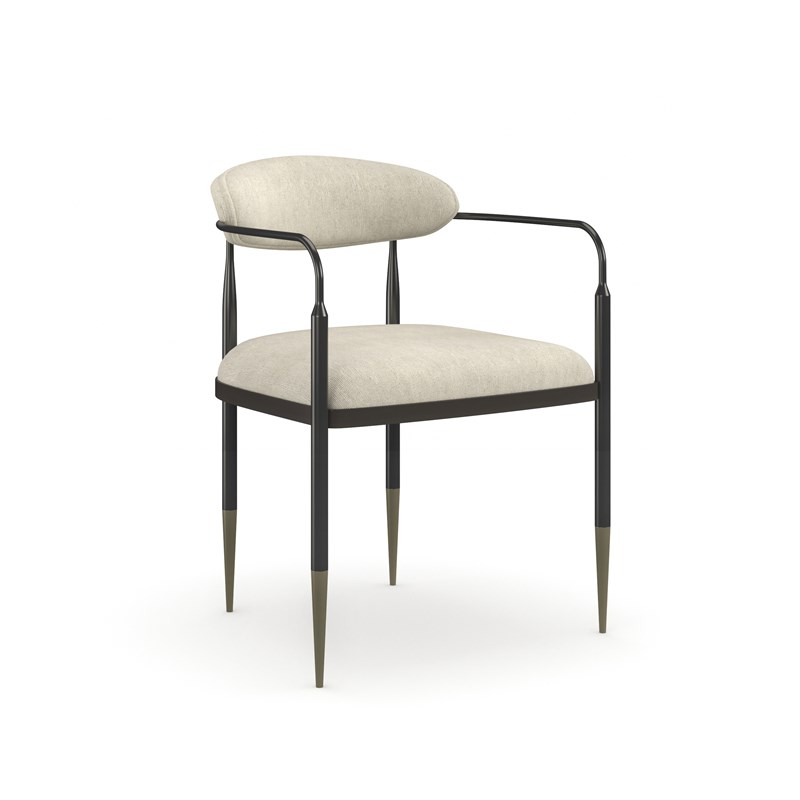 Epoch Armchair by Caracole featuring a rounded back and plush upholstered seat.