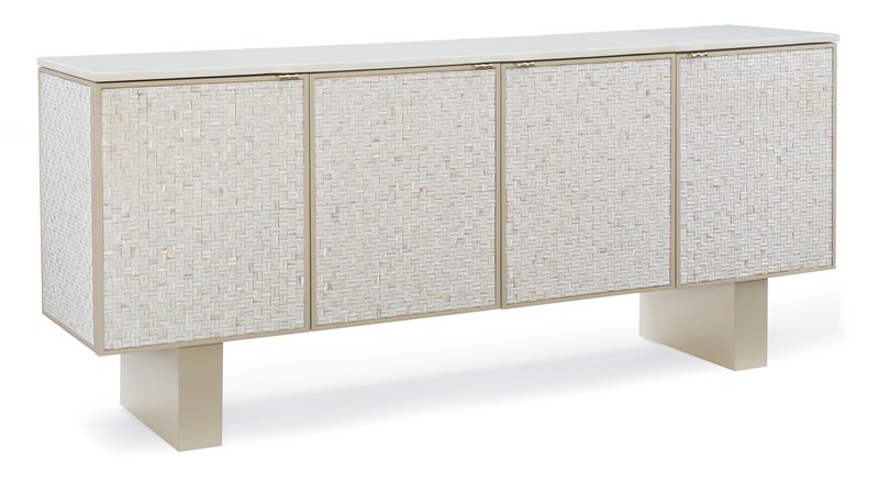 Bomb-Shell by Caracole — a chic barrel-style accent chair with sumptuous upholstery and a gold metal base.