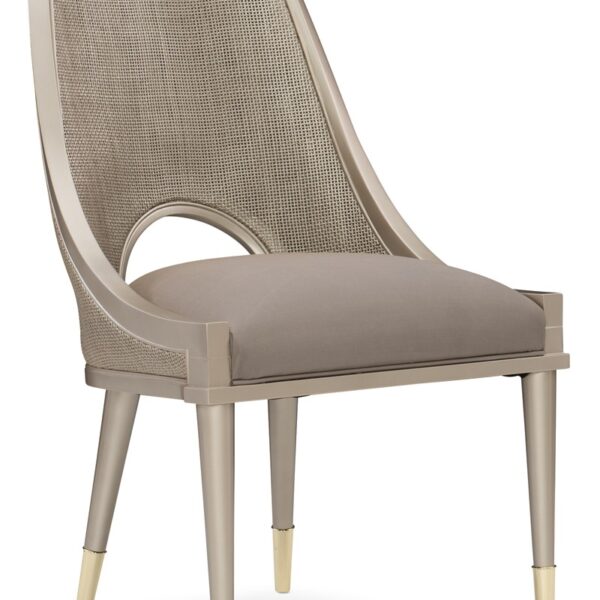 Cane I Join You by Caracole — an elegant chair with woven cane panels and upholstered cushions.