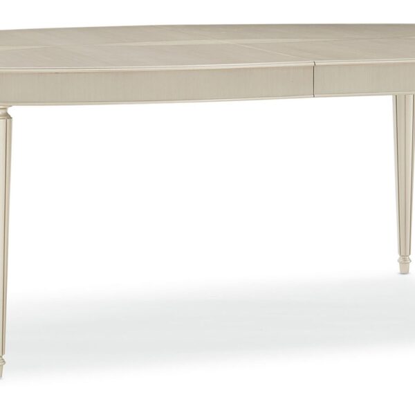 The Source dining table by Caracole with a stunning Smoked Birdseye and Thunder wood top, featuring soft silver paint accents and brushed chrome ferrules.
