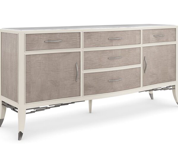 Break From Tradition by Caracole — a refined wood console with curved lines and a dramatic, modern twist.