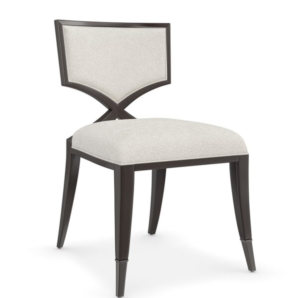 First Chair by Caracole — an elegant accent chair with a curved back and upholstered seat.