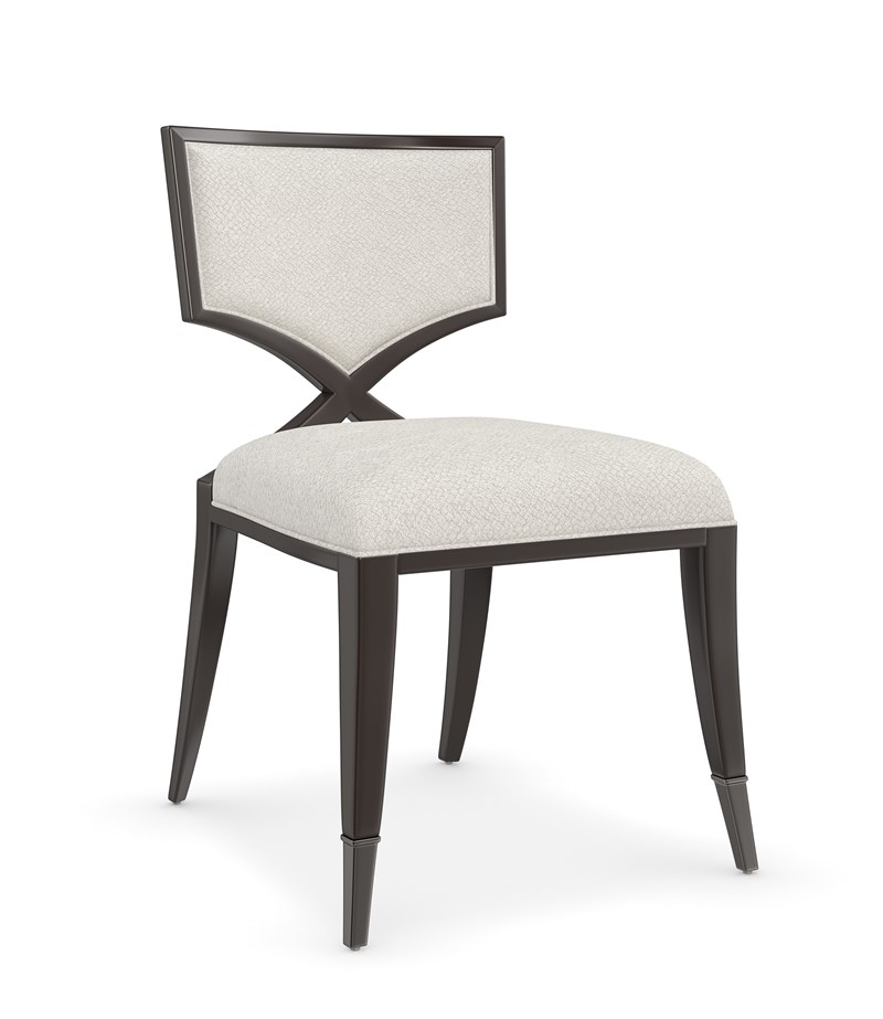 First Chair by Caracole — an elegant accent chair with a curved back and upholstered seat.