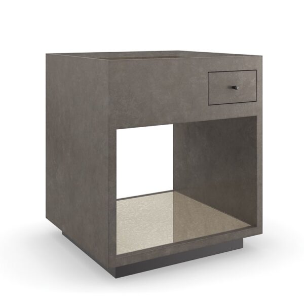 Dark Matter End Table by Caracole — a sleek modern end table with a dark textured top and metal base.
