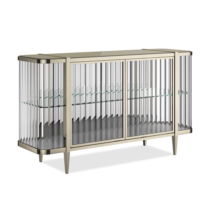 Stop and Stare by Caracole — a stunning console table with a sculptural metal base and clear glass top.