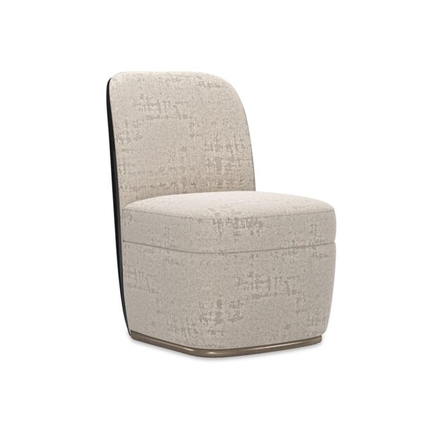 Cabochon Chair by Caracole featuring a rounded backrest and elegant upholstered frame.
