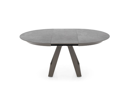 "ATLAS dining table by Calligaris with rectangular glass top and black metal legs in a modern dining room."