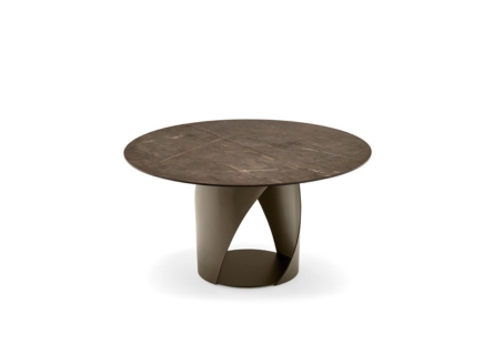"CYCLONE dining table by Calligaris with white marble-effect ceramic top and sculptural metal base in matte black."
