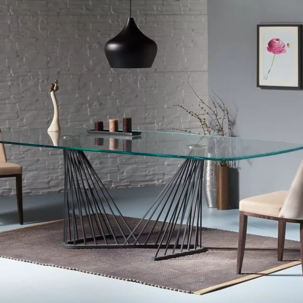 Cora high‑back dining chair by Peressini upholstered in teal fabric with dark stained oak legs, shown against a white studio backdrop.