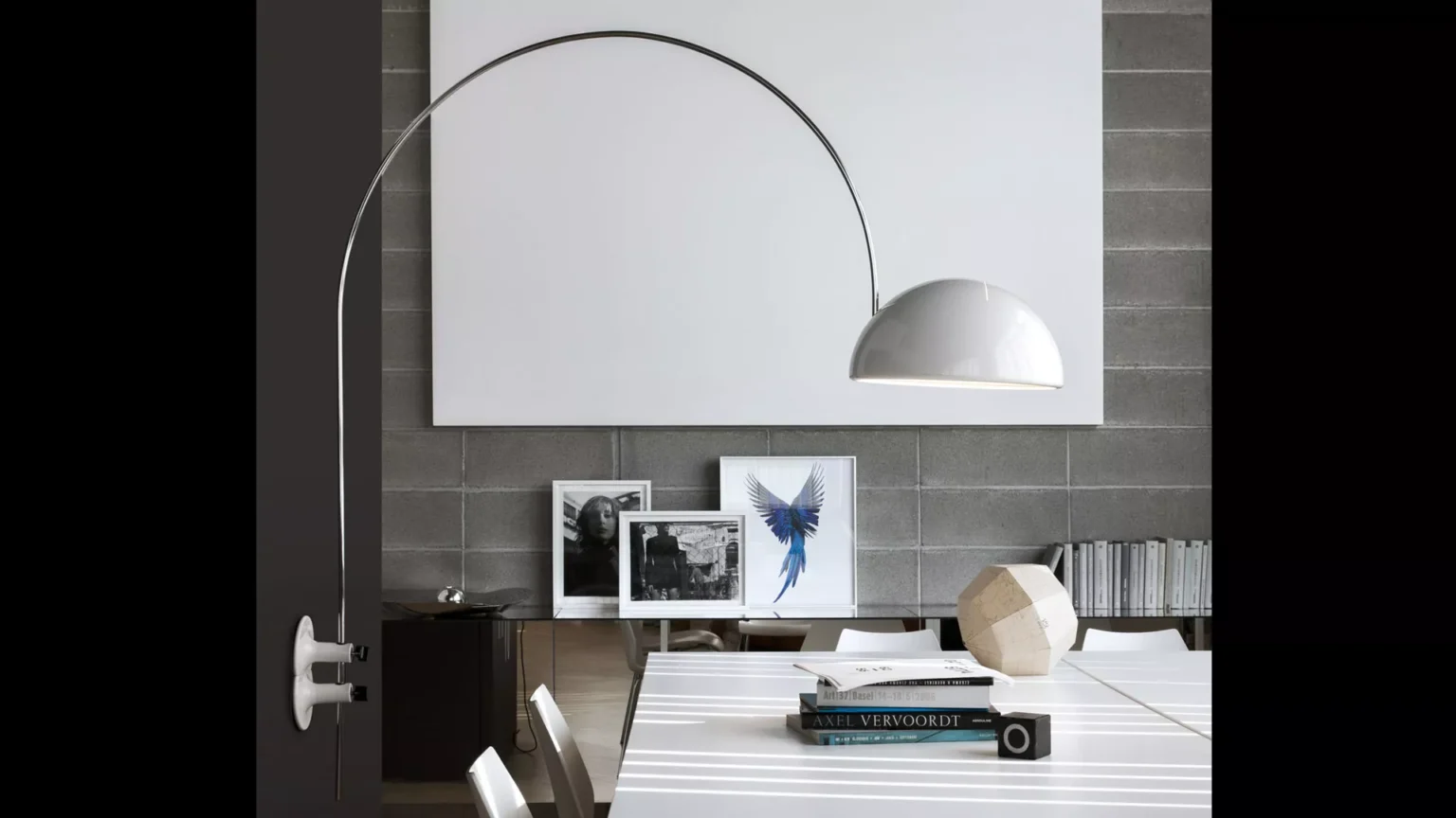 “Coupé by Oluce iconic designer lighting – sleek curved arm with swivel reflector and mid-century modern appeal”