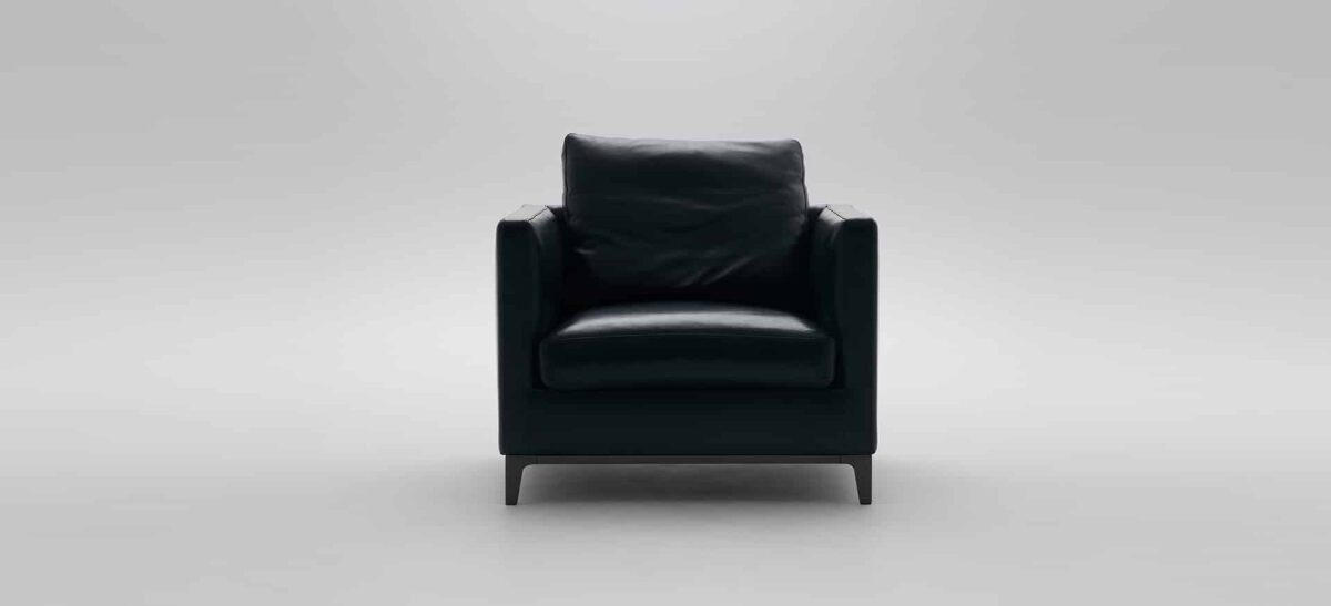 Modern Crescent Chair by Camerich upholstered in olive velvet with curved low back and tapered wooden legs