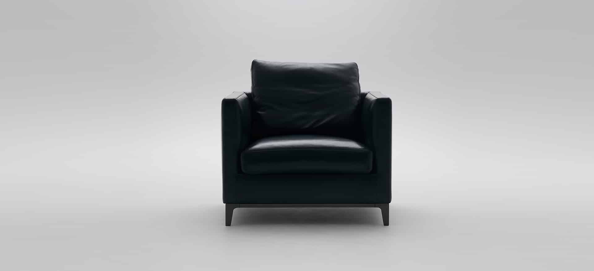 Modern Crescent Chair by Camerich upholstered in olive velvet with curved low back and tapered wooden legs