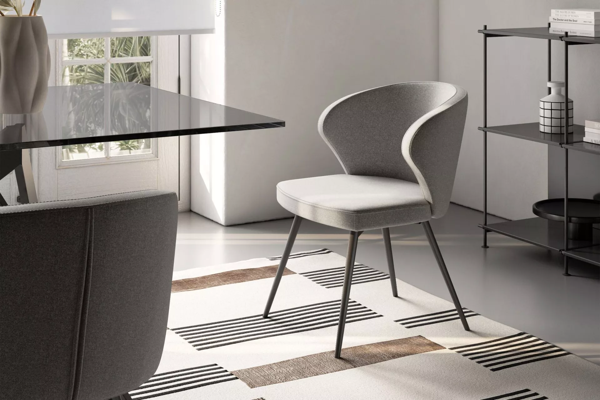 Doris P chair by Peressini with upholstered seat and slim metal legs in a modern dining room.