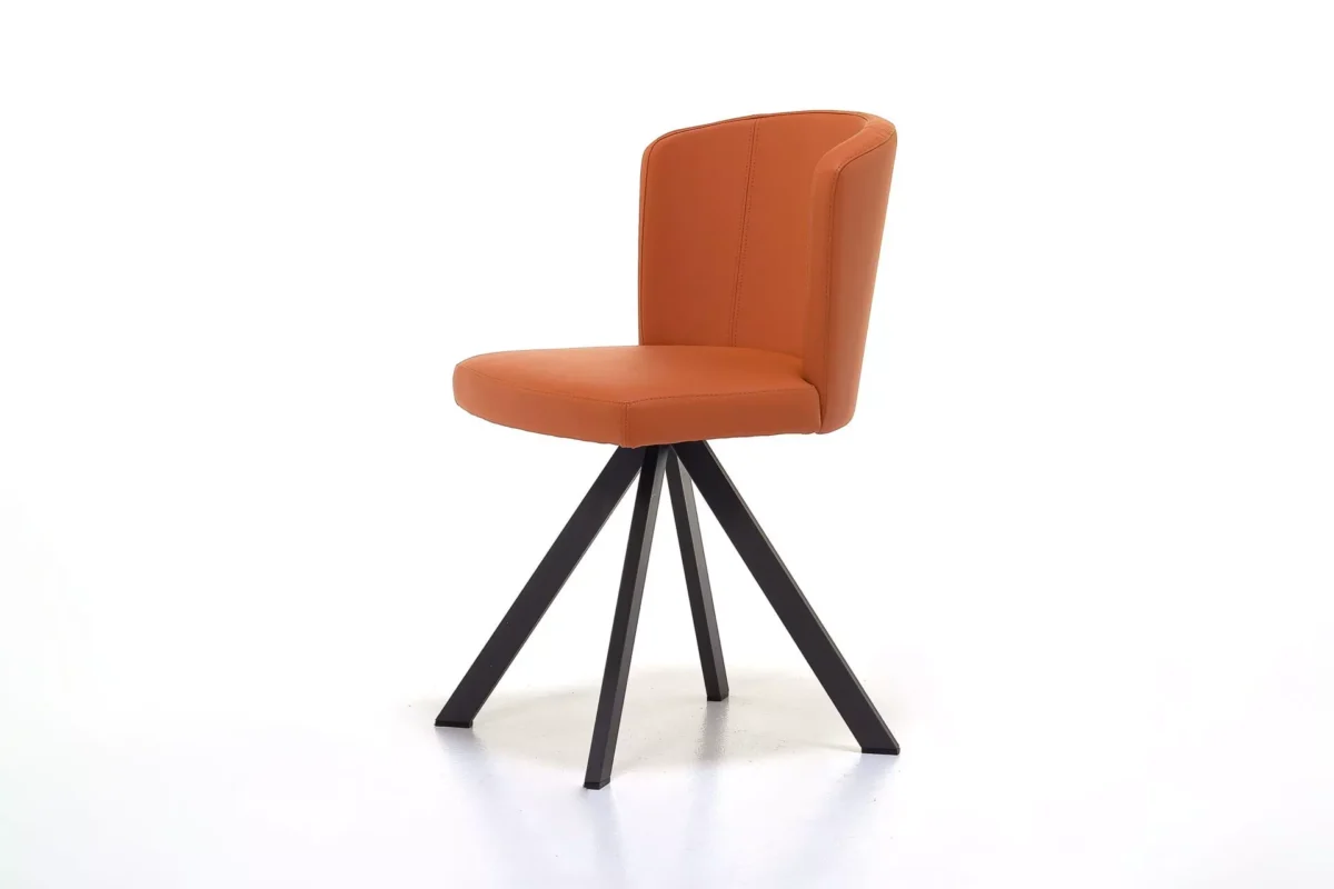 Peressini Doris S dining chair upholstered in burnt-orange fabric on matte black metal legs, studio-lit against a plain white backdrop.