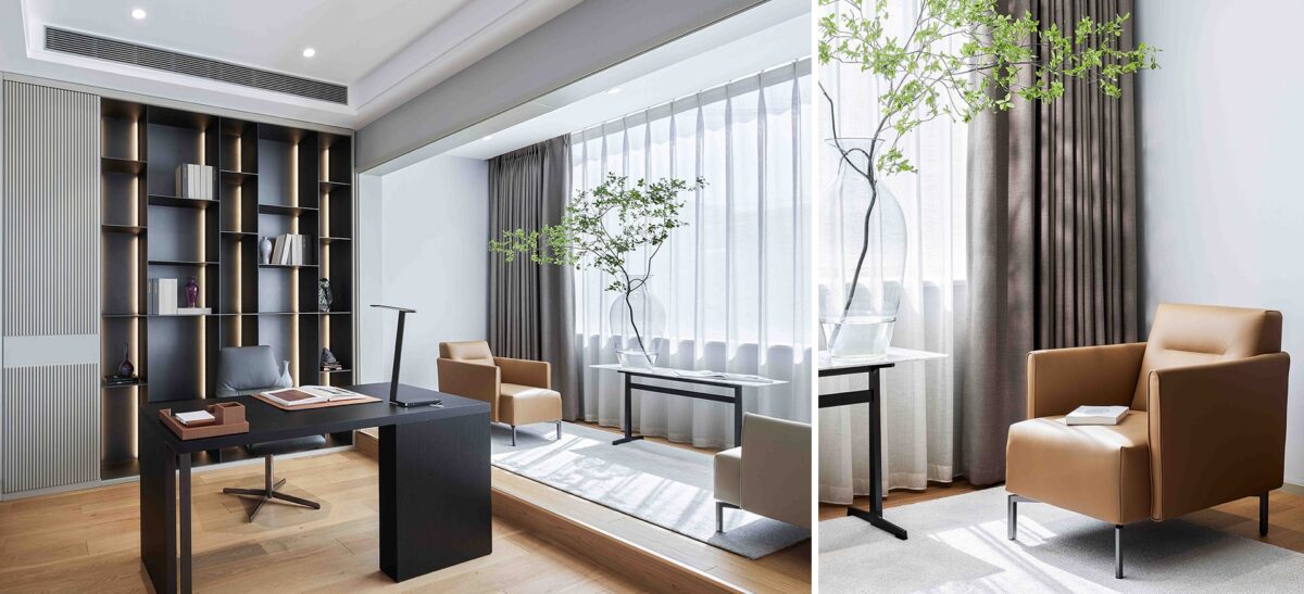 Modern lounge chair with padded arms, neutral upholstery, and slim metal legs