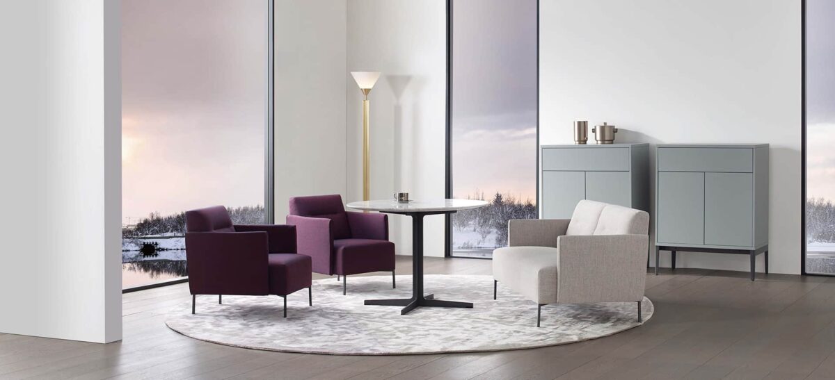 Ease chair by Camerich in olive fabric with square back cushions and black tubular steel base