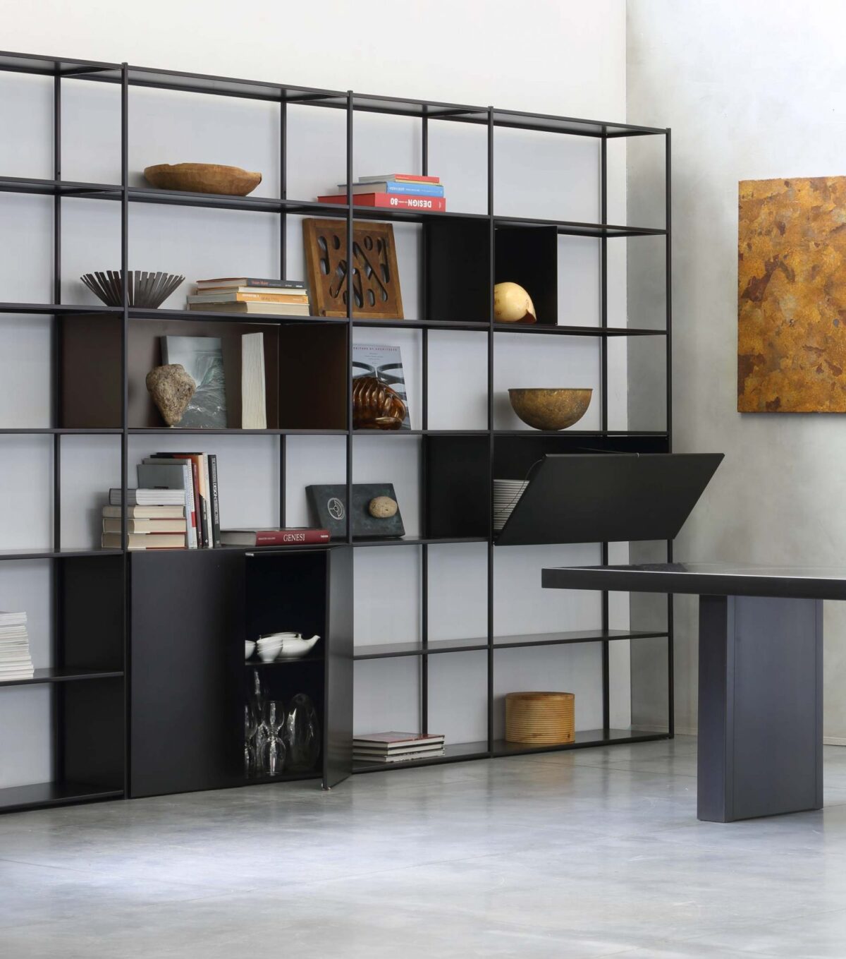Minimalist steel shelf unit with integrated storage boxes by Zeusnoto.