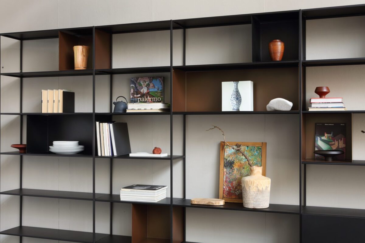 Minimalist steel shelf unit with integrated storage boxes by Zeusnoto.