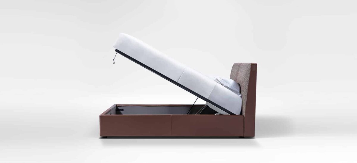Minimalist upholstered bed with clean lines and low profile by Camerichusa.