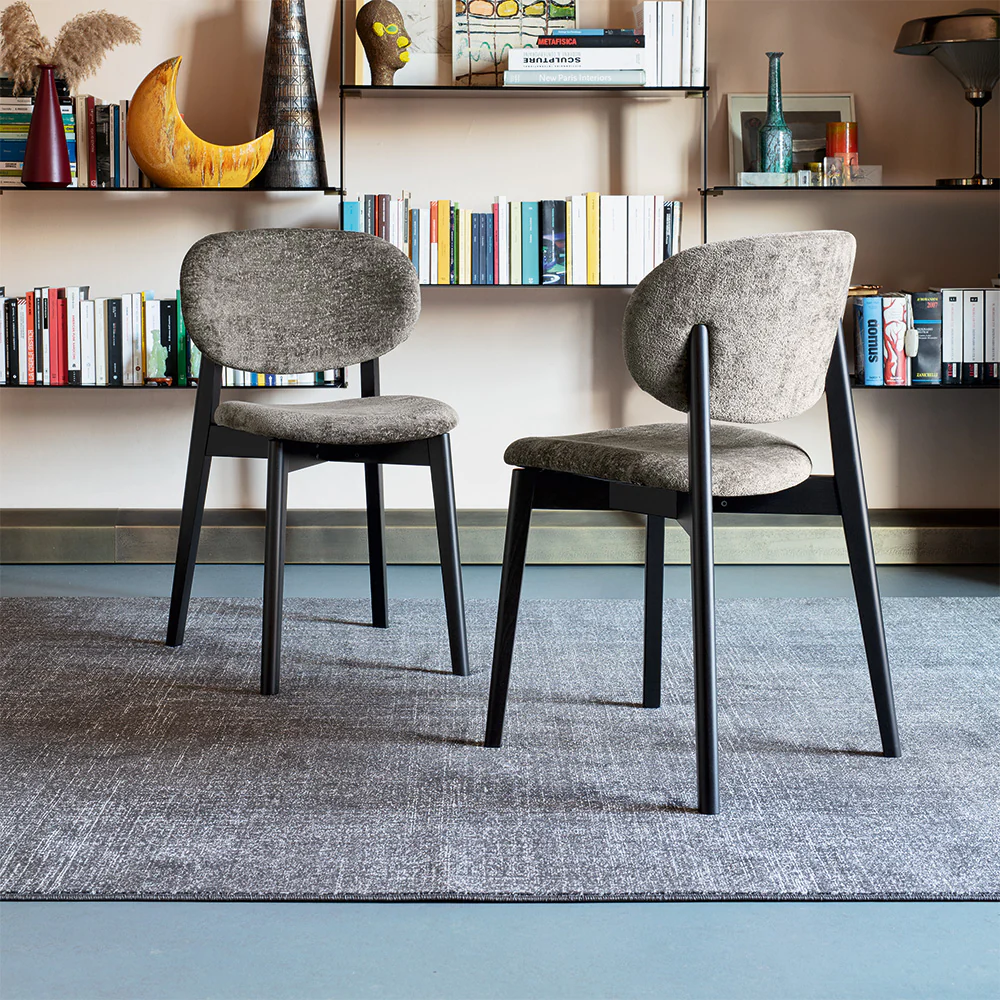“Eide Soft chair by Connubia – modern upholstered dining chair with curved backrest and slim legs”