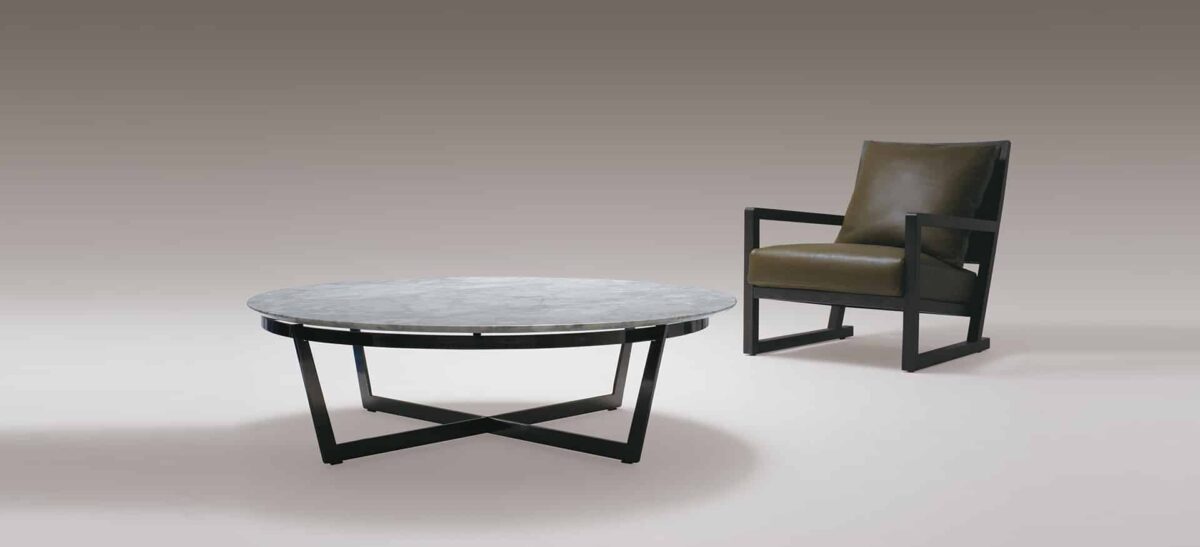 Modern rectangular dining table with wood top and sleek metal base by Camerich.