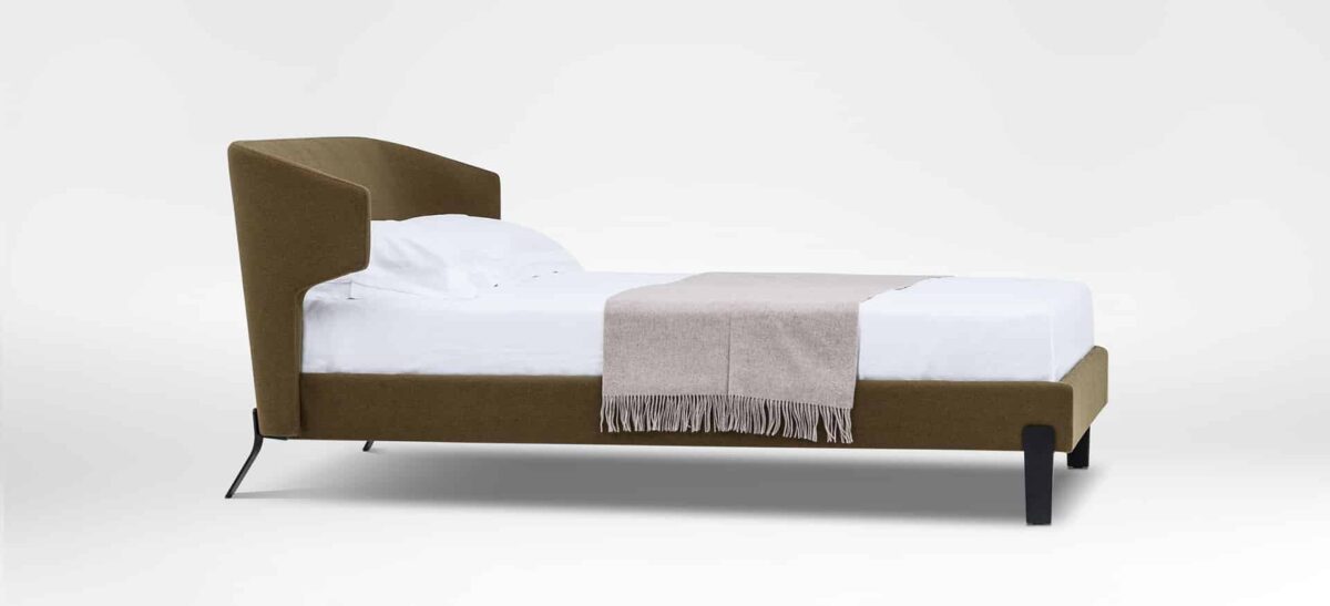 Contemporary upholstered bed with rounded headboard and sleek frame by Camerich.