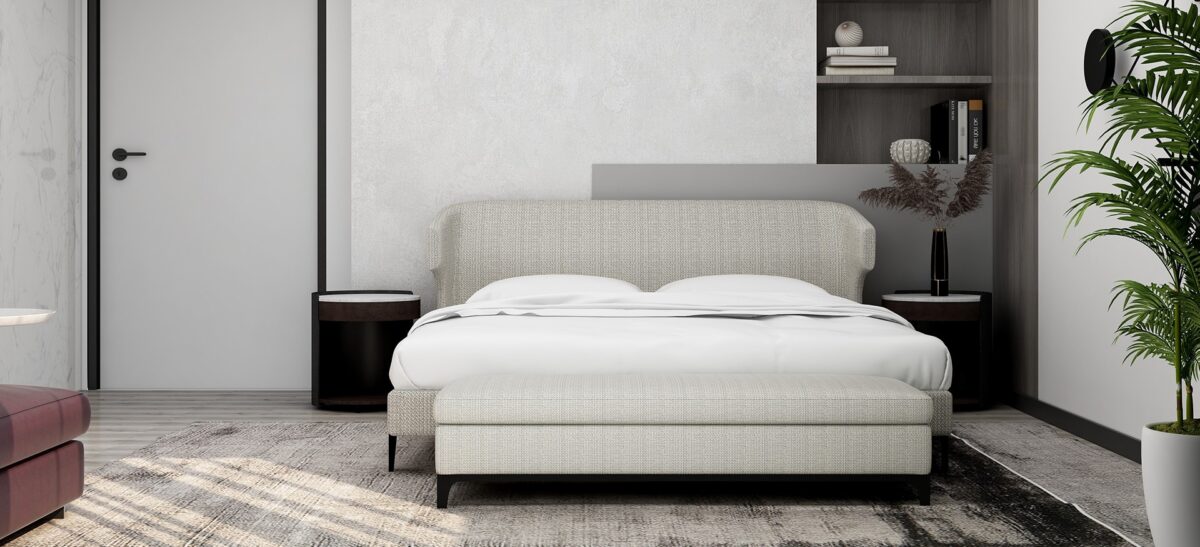 Contemporary upholstered bed with rounded headboard and sleek frame by Camerich.