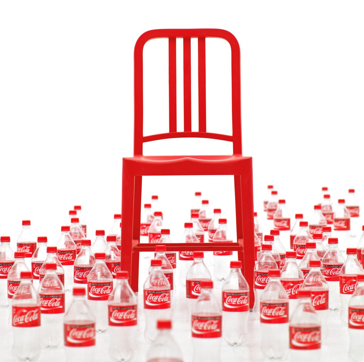 Emeco’s 111 Navy Chair, designed with recycled PET bottles for a sleek, modern look and durable build.